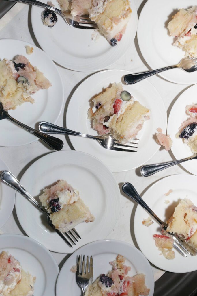 Display of wedding cake, sliced for guests to take