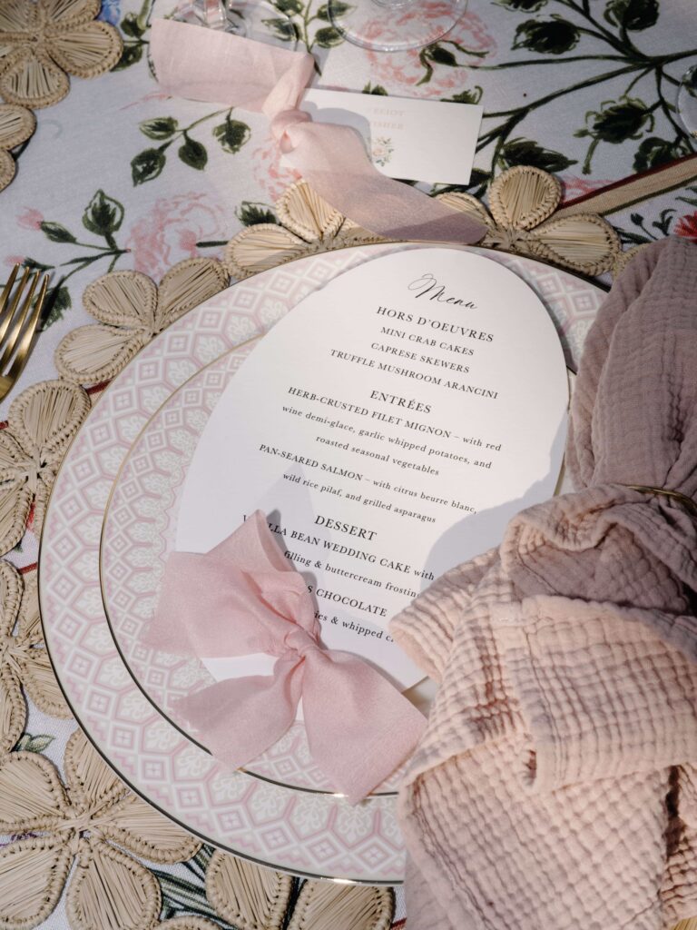 Oval wedding menu card with a pink bow