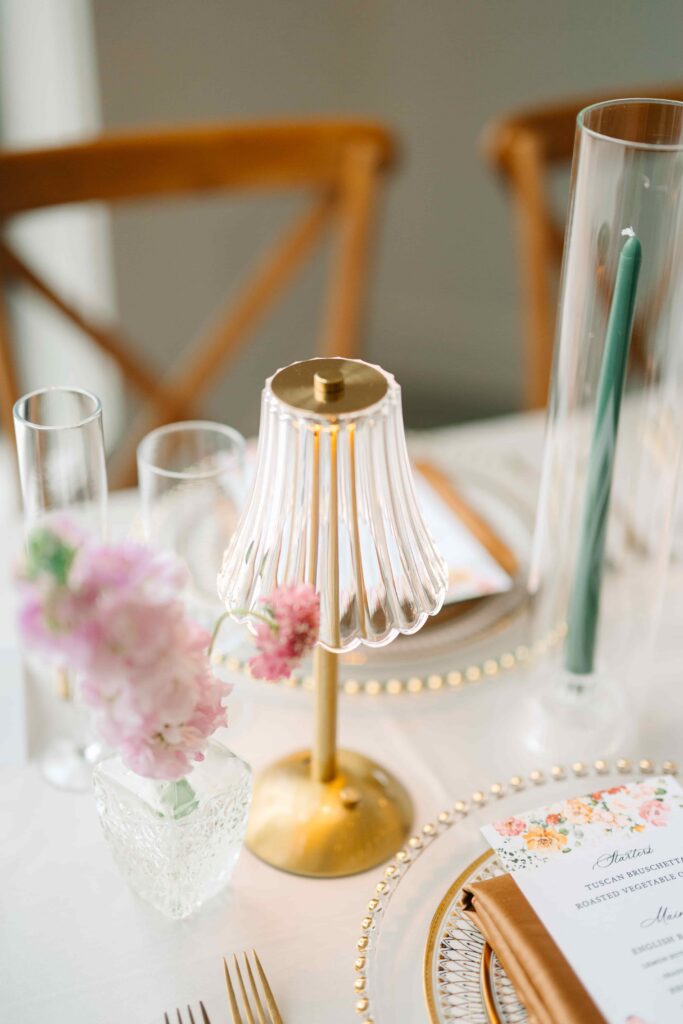 Glass lamp on a whimsical wedding tablescape
