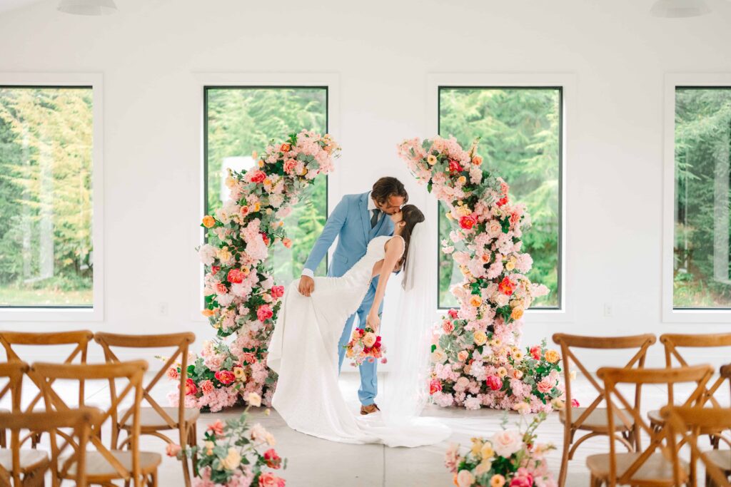 Couple kissing during their summer wedding ceremony at The Wellspring Ohio