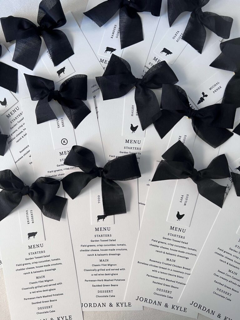 Classic black and white wedding menus with black silk ribbon