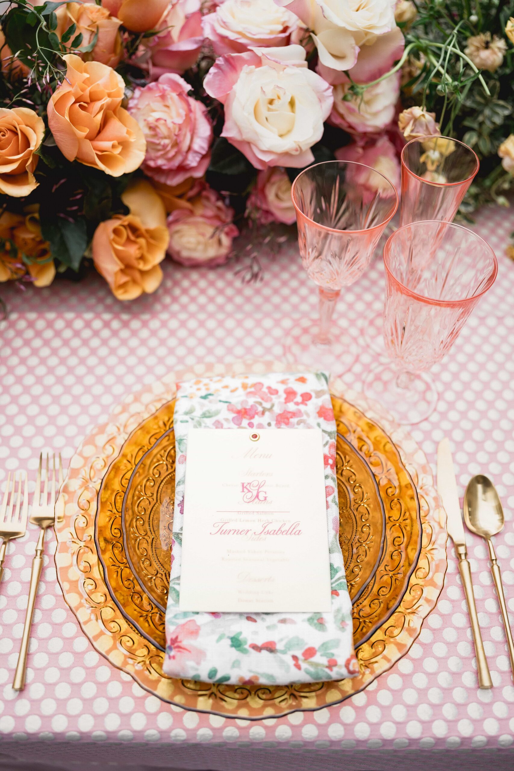 Wedding menu card with vellum overlay featuring a custom monogram