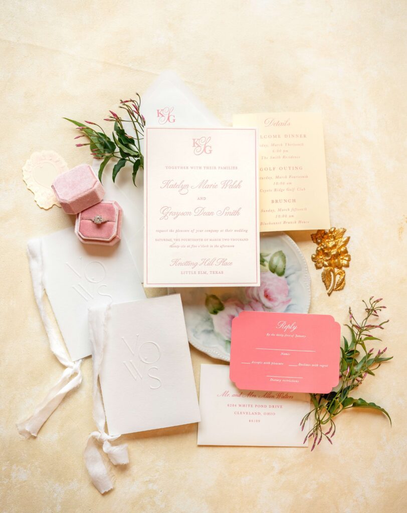 Custom letterpress suite with a monogram on the invitation and liner