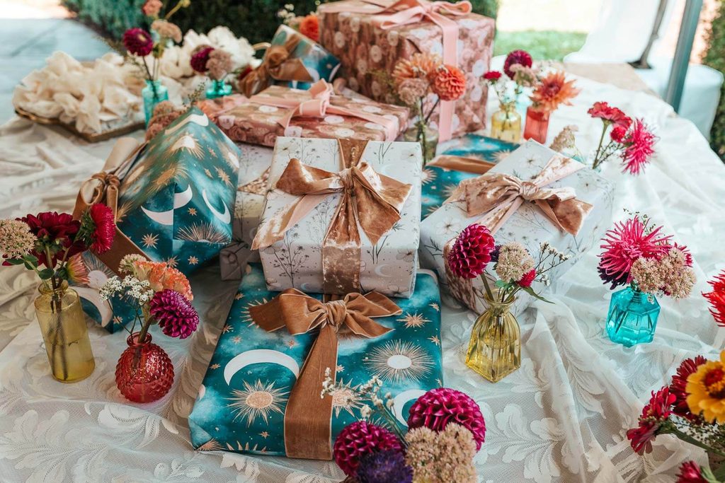 Bridal shower gifts for guests, decorated with celestial themed wrapping paper